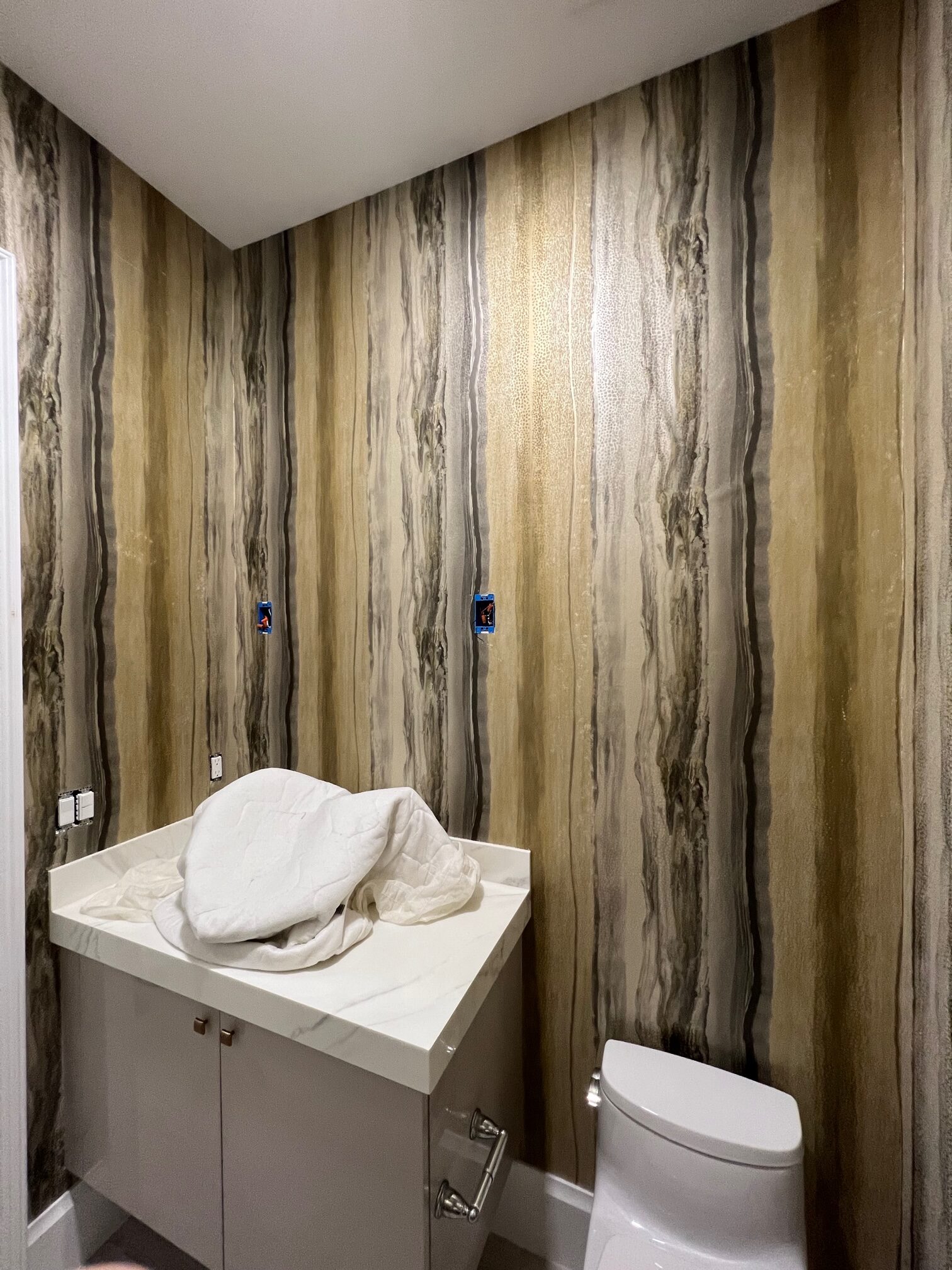 Sunny Isles Beach luxury condo wallpaper installation service - oceanfront property transformation